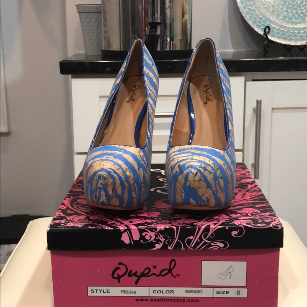 Qupid size 8 blue zebra print heels.
